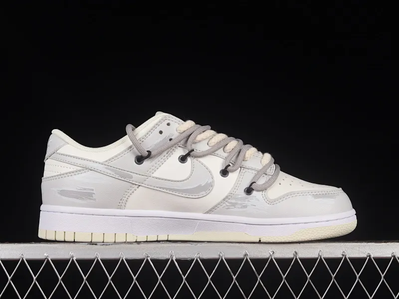 All Categories Nk SB Dunk Series Nk SB Dunk Low Low-top Sneakers Nk Dunk Low Retro "Coconut Milk" Vibe Wind Distressed Paper Plane Travel Graffiti Customized Deconstructed Strap Casual Sneakers DJ6188-100